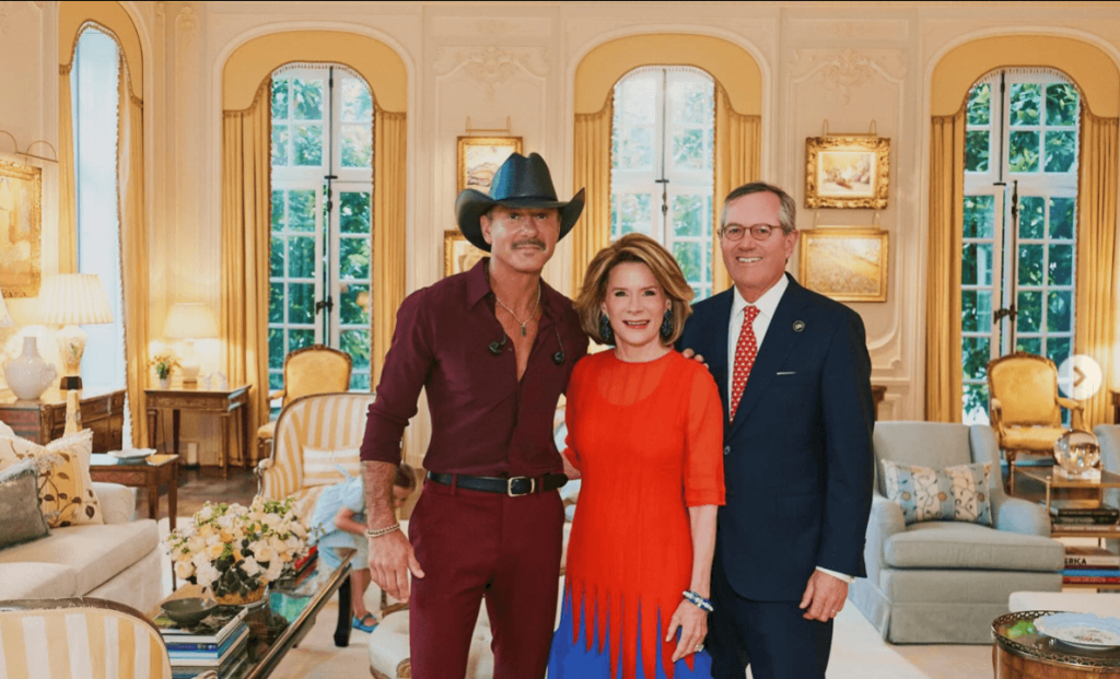 Tim McGraw performing on stage at the US Ambassador's residence gala